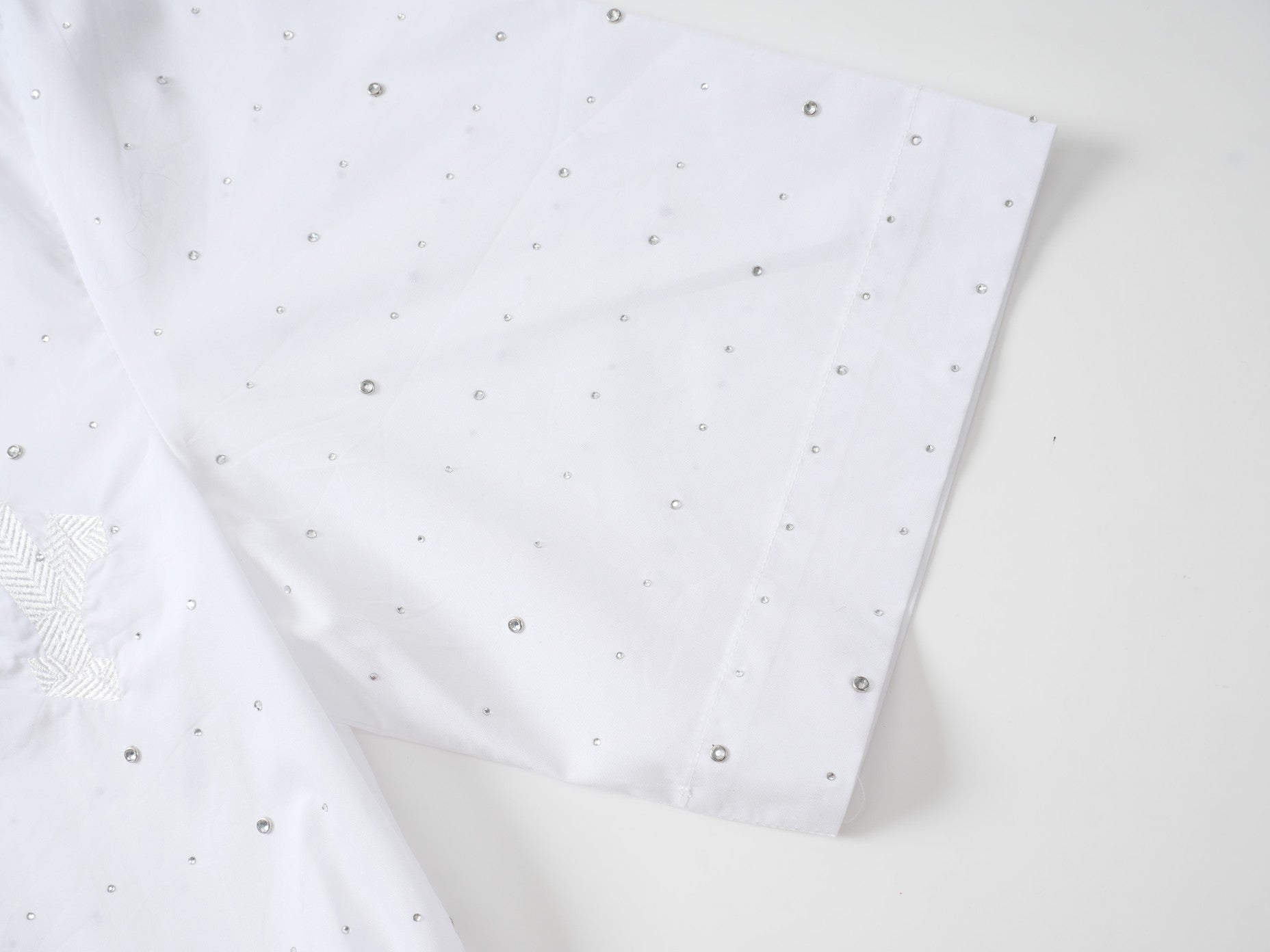 G's T-shirts with metal diamonds all over them