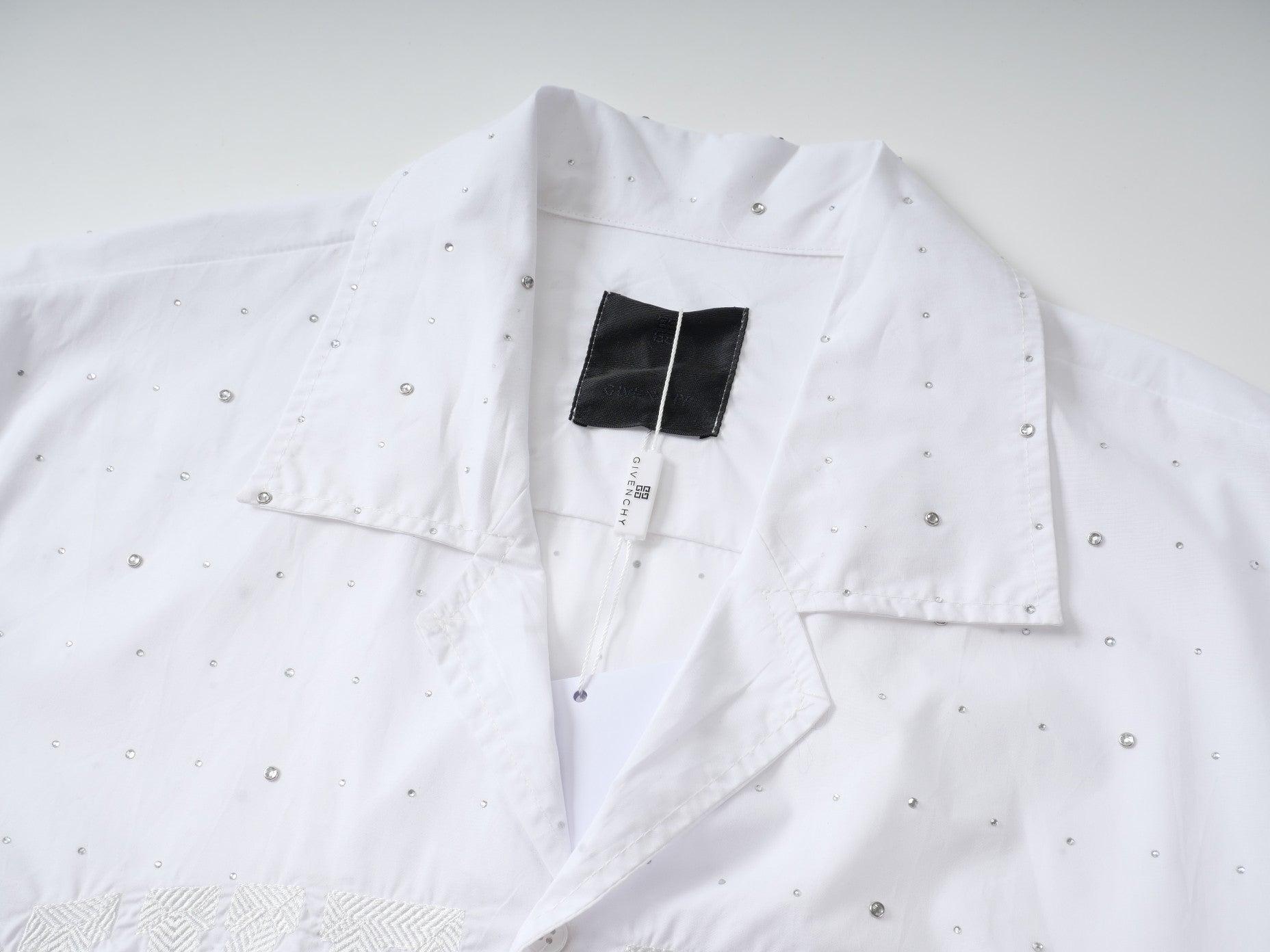 G's T-shirts with metal diamonds all over them